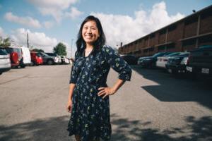 Dr. Kuang posing in a parking lot