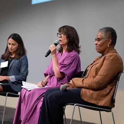 Central Health Employee with a microphone